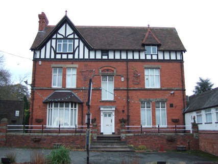 Picture of the main building at The Hollies